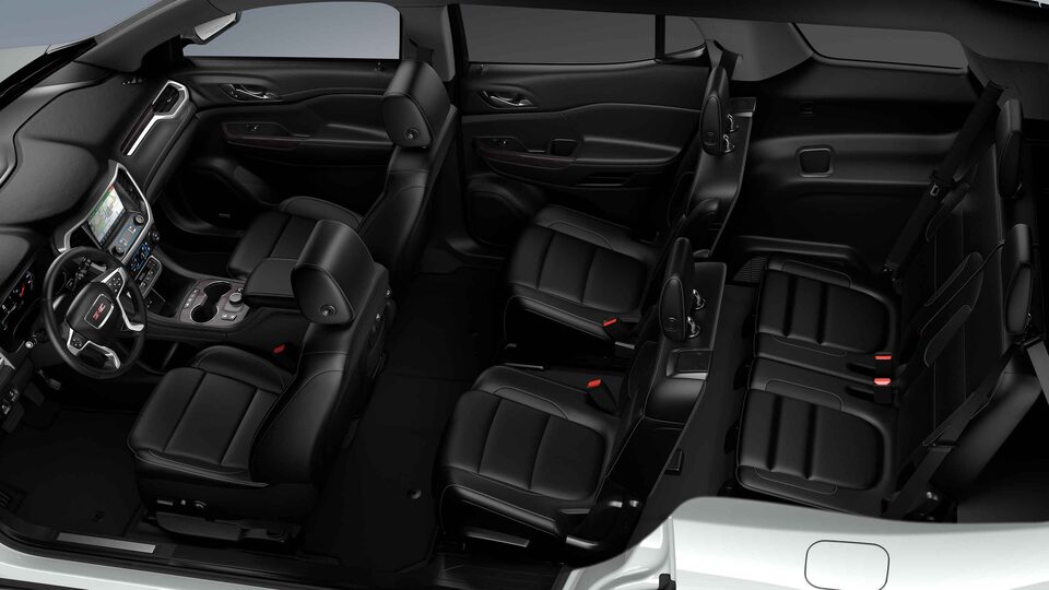Closeup on the Steering Wheel, Heads-Up Display, and Jet Black Interior of the new GMC Acadia 