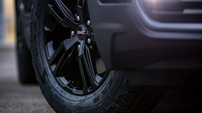 Closeup on Jet Black Rim and Tires on the GMC Terrain AT4