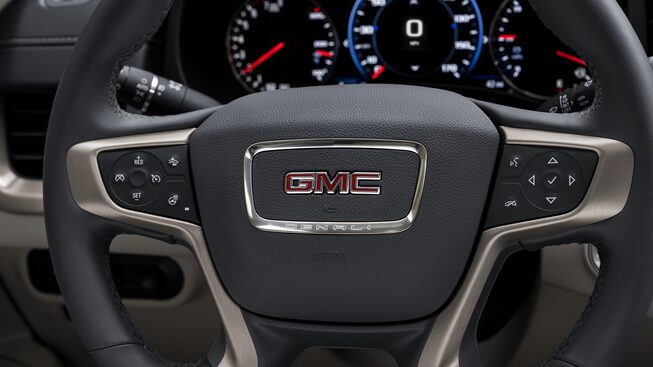 The Sleek Design of the 2024 Terrain Denali Steering Wheel Equipped with Driver Friendly Technology 