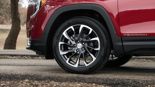 Closeup On Rims and Tires on the Red GMC Terrain SLT
