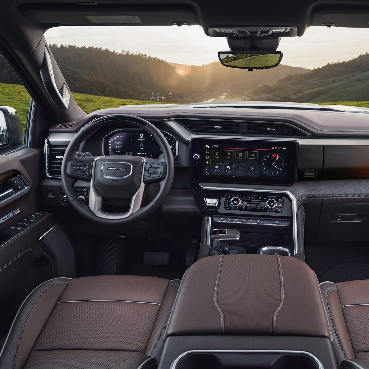 Interior View of the Steering Wheel and Infotainment Screen in the GMC Sierra 1500 Full-Size Truck