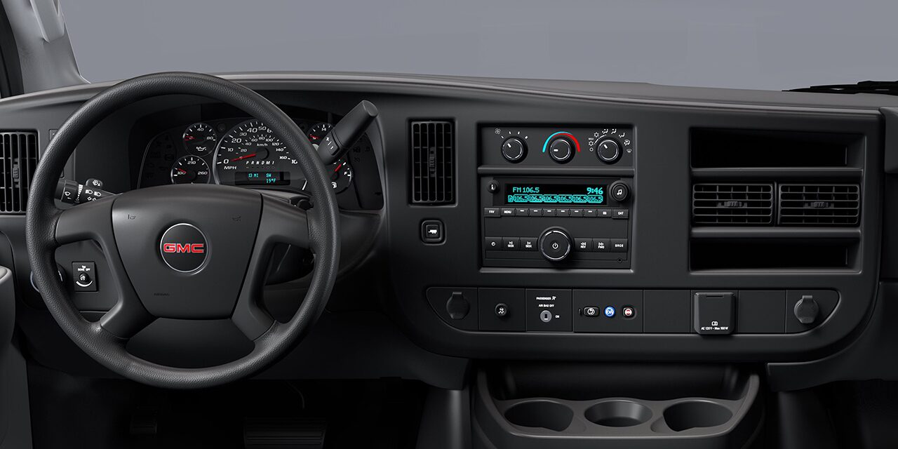 Interior View of the Steering Wheel and Dashboard in the Savana Cutaway Van