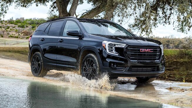 Marine Metallic GMC Terrain SLT Driving Off-Road through Water and Mud