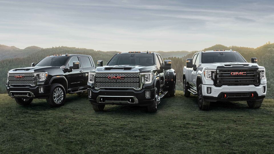 The Imposing Fleet of Sierra HD Trucks with an Incredible Backdrop