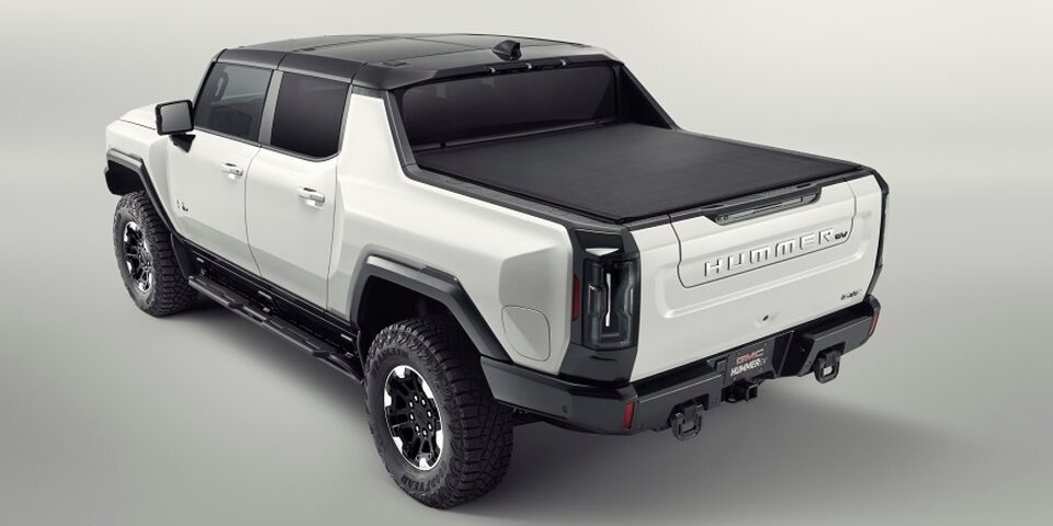 Rear Three-Quarters View of a 2025 White Hummer EV Pickup Truck