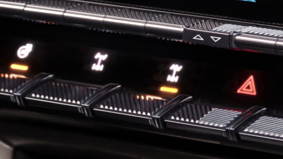 Close-Up View of the 2025 Hummer EV Pickup Truck's Front and Rear E-Locker Controls on Dashboard