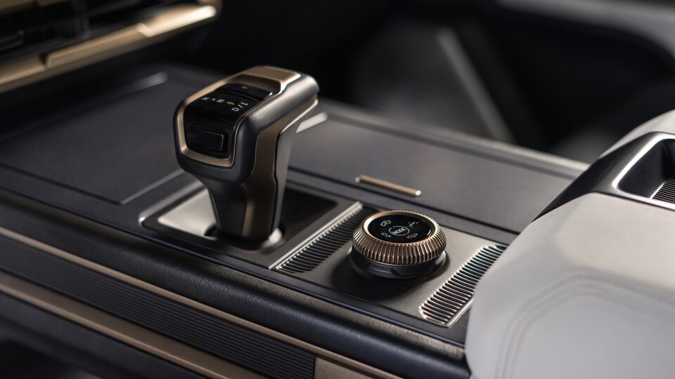 Close-Up of the Drive Mode Selector and Gear Shifter on the Center Console