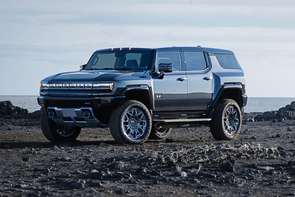 Front Three-Quarters View of the 2025 Hummer EV Pickup Truck at Dusk