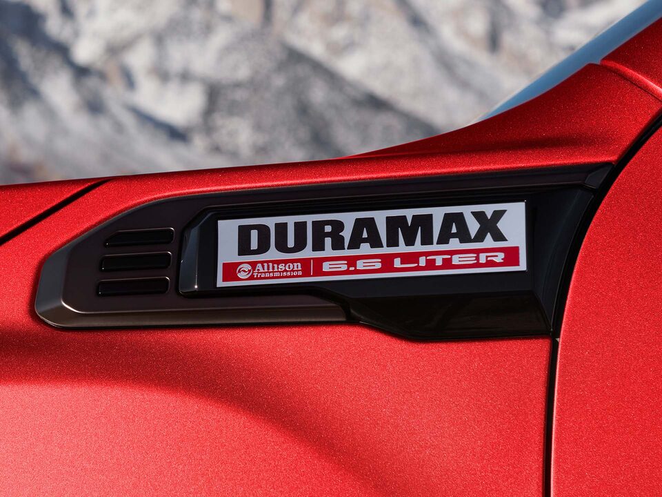 Close-up of "Duramax & Allison Transmission" Emblem on a GMC Truck