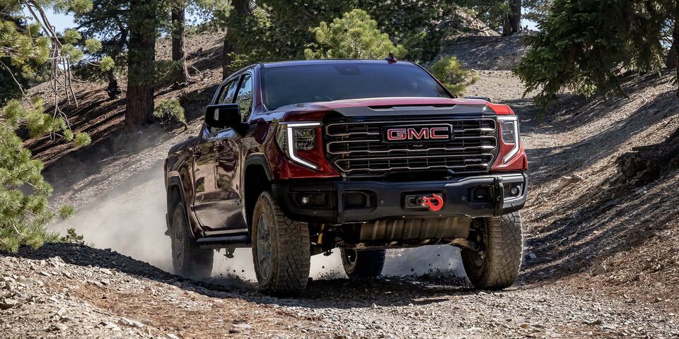 Front View of the Sierra AT4 Driving Down an Off-Road Trail