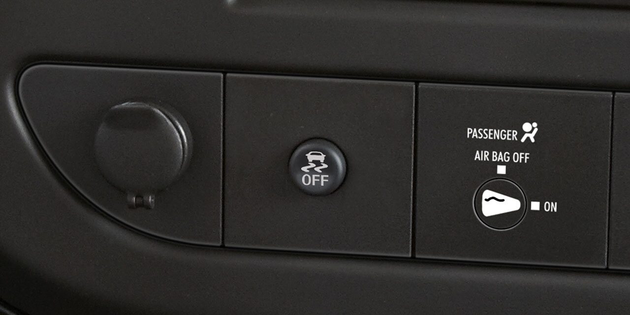 Close-Up of the Stabilitrak Button in a 2026 GMC Savana Cutaway Van