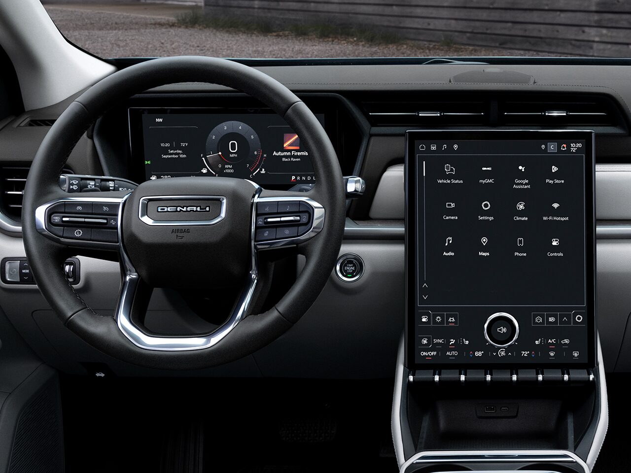 Interior View of the Steering Wheel and Infotainment System in the 2026 GMC Terrain Denali Luxury SUV