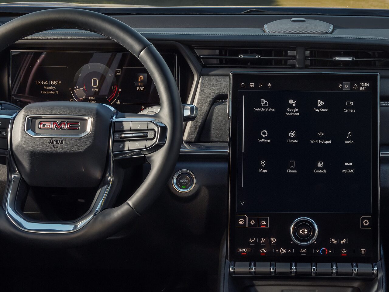 Interior View of the Steering Wheel and Infotainment System in the 2026 GMC Terrain Elevation Compact SUV