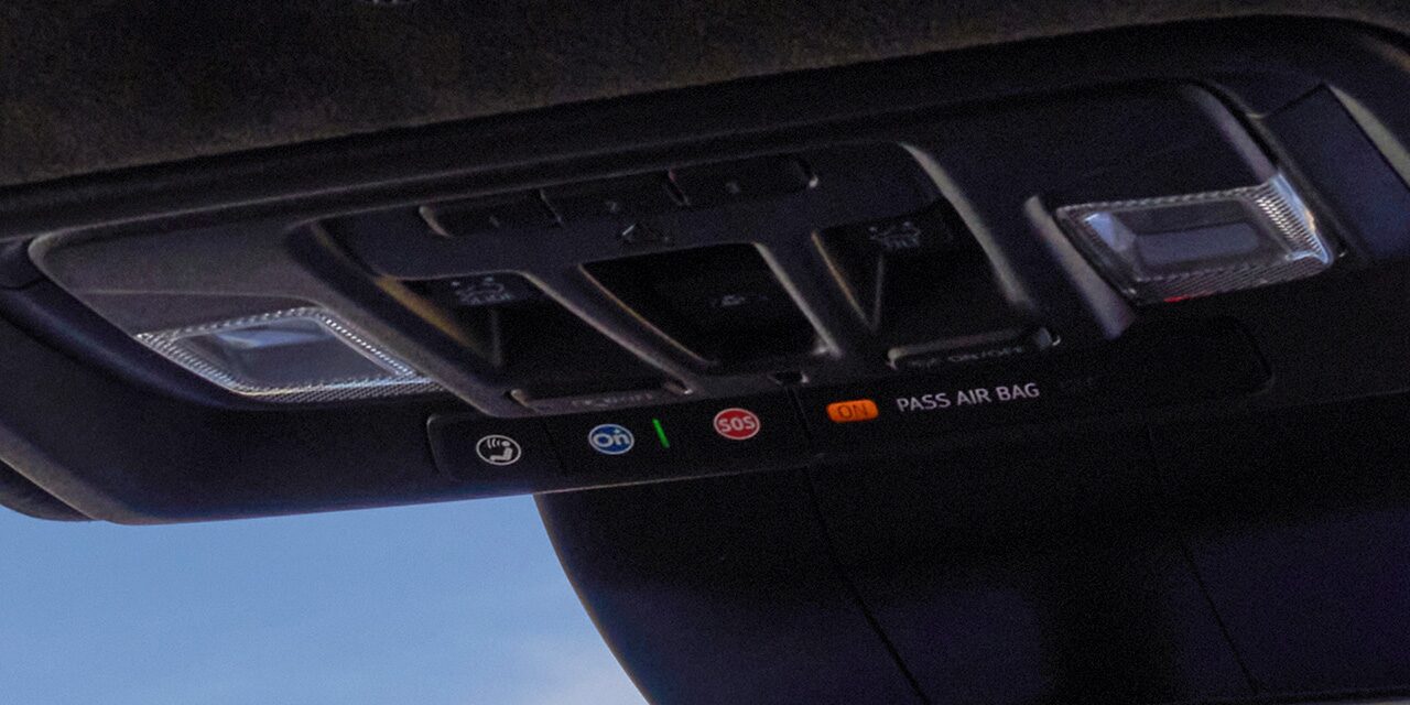 Close-up of the OnStar Basics In-Vehicle Blue Button