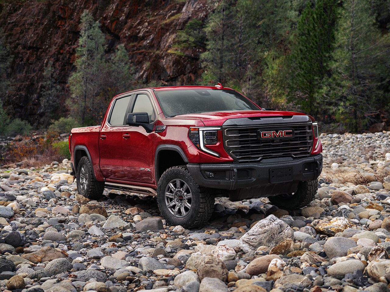 The GMC Sierra AT4 and At4X Off-Road Trucks Parked Side by Side